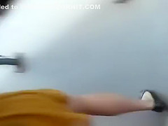 Woman in short yellow dress