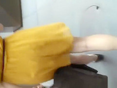 Woman in short yellow dress