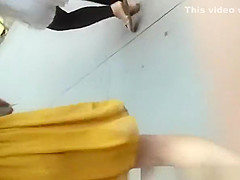 Woman in short yellow dress