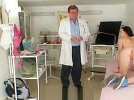 Young brunette in complete gyno exam