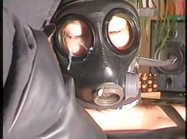 jizz flow on woman in gasmask