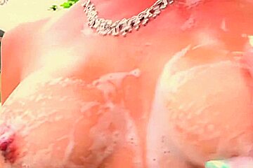 sexy milf feeding her pussy covered in foam