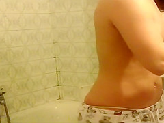 teen 18+ girl filmed as she dries hair